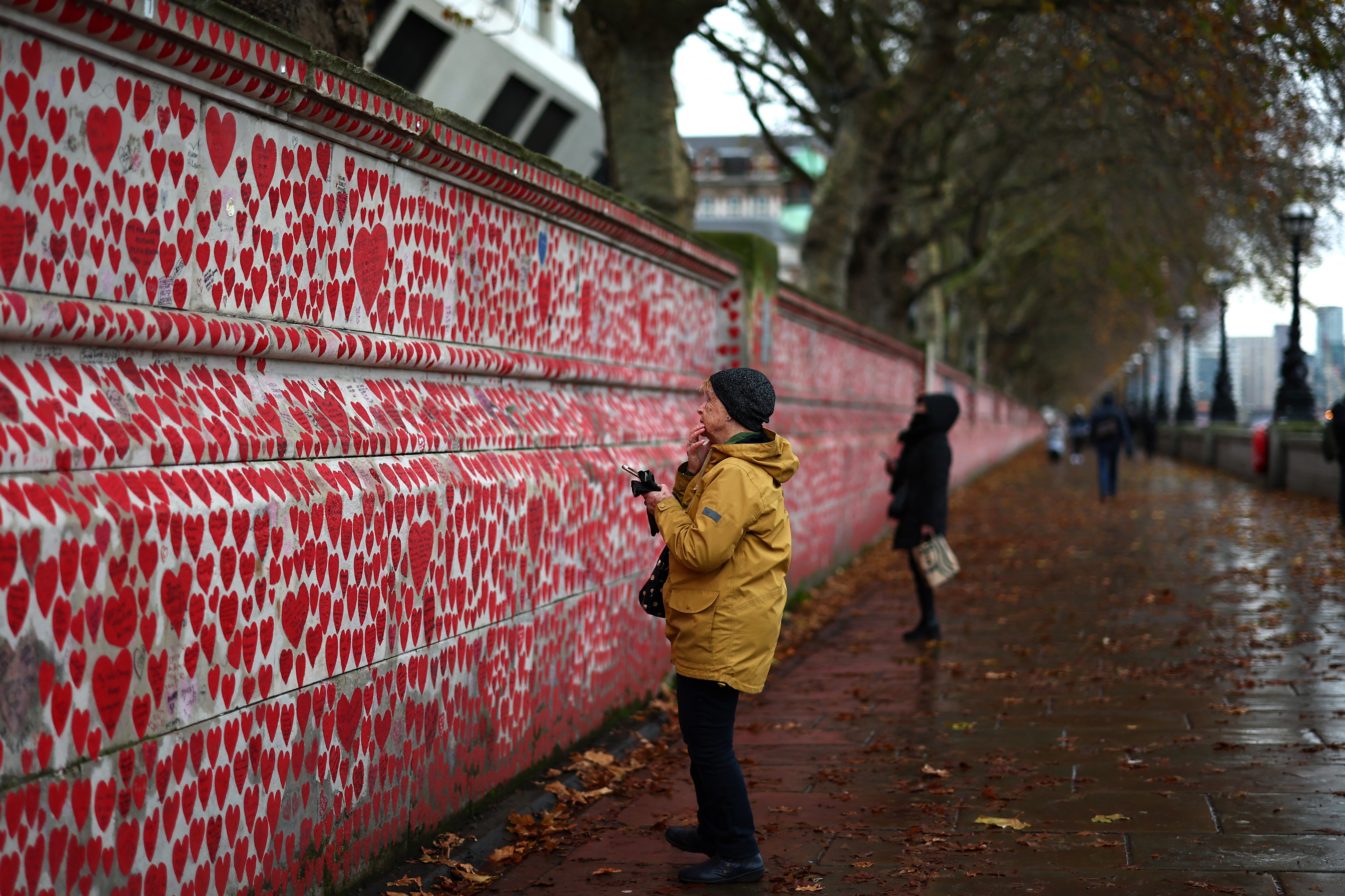 Person viewing the National Covid Memorial Wall in London.